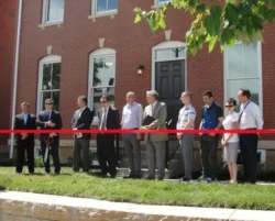 C.F. Vatterott snips ribbon for five homes on site of historic Charless School